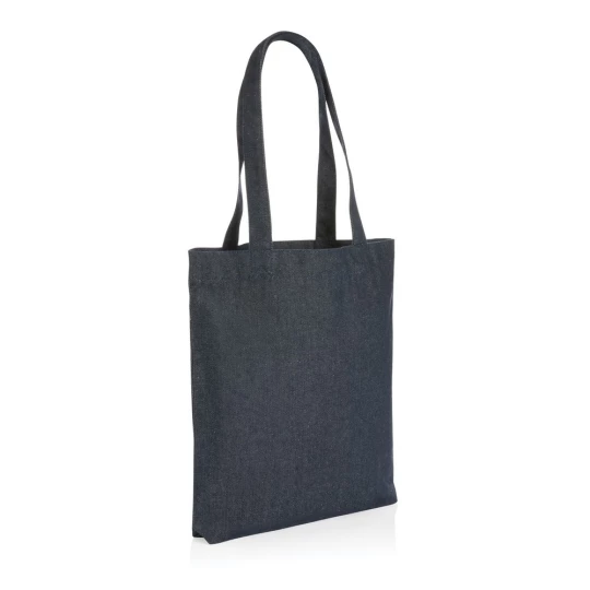 The Impact AWARE™ recycled denim tote 320gsm  is the perfect way to carry your essentials in style. This spacious tote provides sufficient space for your tech accessories and other daily needs. With AWARE™ tracer that validates the genuine use of rec-1