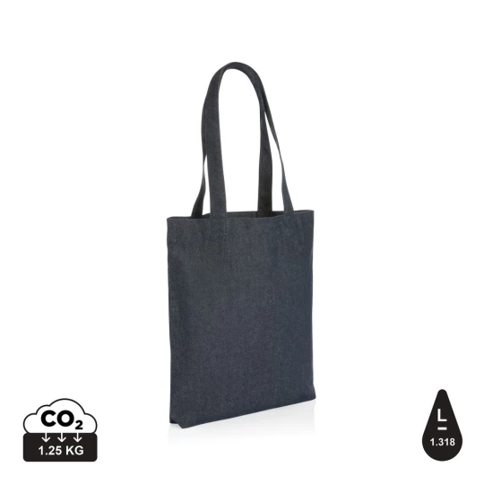 The Impact AWARE™ recycled denim tote 320gsm  is the perfect way to carry your essentials in style. This spacious tote provides sufficient space for your tech accessories and other daily needs. With AWARE™ tracer that validates the genuine use of rec-1
