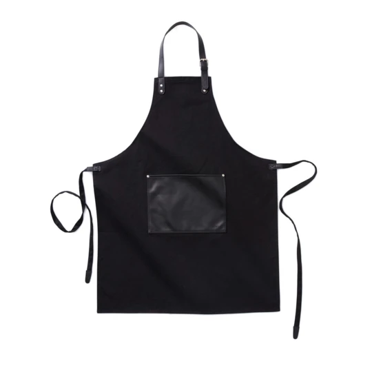 Stylish and classic apron in thick cotton canvas with discreet details in vegan leather. Adjustable buckle closure at the top and large pocket in the front. An apron with a long lifespan that only gets more beautiful with time. (VG019-03)-1