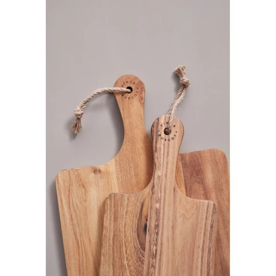 Robust and very handy cutting/serving board that thanks to its length of 75 cm and width of 15 cm has a large enough surface for being used both for cutting and serving.  The board is made of FSC-certified teak and has a beautiful golden to medium br-1
