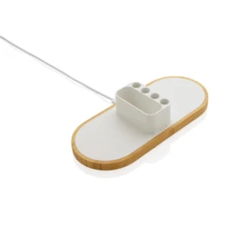 Dual 10W fast wireless charger with pen holder made with RCS (Recycled Claim Standard) certified recycled ABS. Total recycled content: 31% based on total item weight. RCS certification ensures a completely certified supply chain of the recycled mater