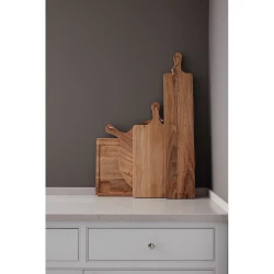 Robust and very handy cutting/serving board that thanks to its length of 75 cm and width of 15 cm has a large enough surface for being used both for cutting and serving.  The board is made of FSC-certified teak and has a beautiful golden to medium br-7